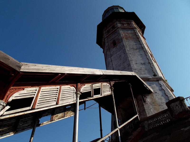 damaged, blue, antique, low angle view, bojeador, outdoors, brick, structure, window, sky, ilocos norte, clear sky, architecture, building exterior, ancient