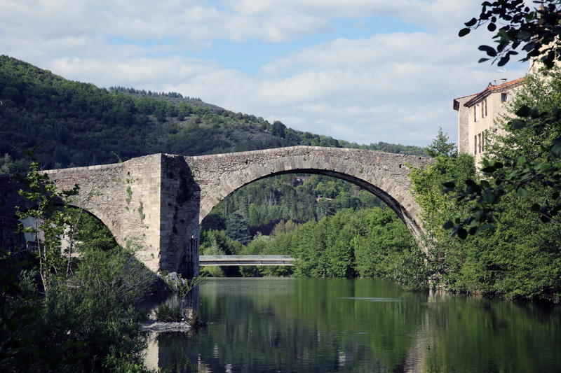 water, cloud - sky, the vigan, transportation, day, arched, outdoors, plant, river, bridge, nature, tree, reflection, built structure, connection, gard