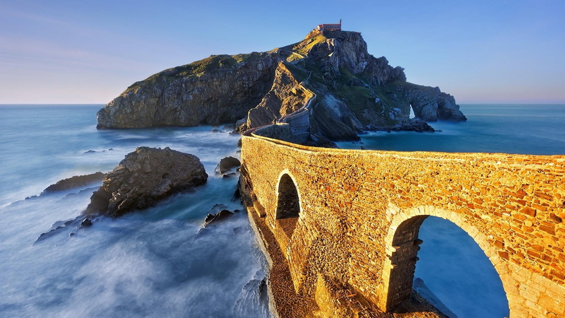 arch, rock, rock formation, island, horizon over water, spain, tranquil scene, bridge, non-urban scene, gaztelugatxe, land, nature, outdoors, tranquility
