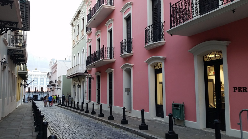 outdoors, footpath, direction, the way forward, city, built structure, window, people, group of people, lifestyles, residential district, building exterior