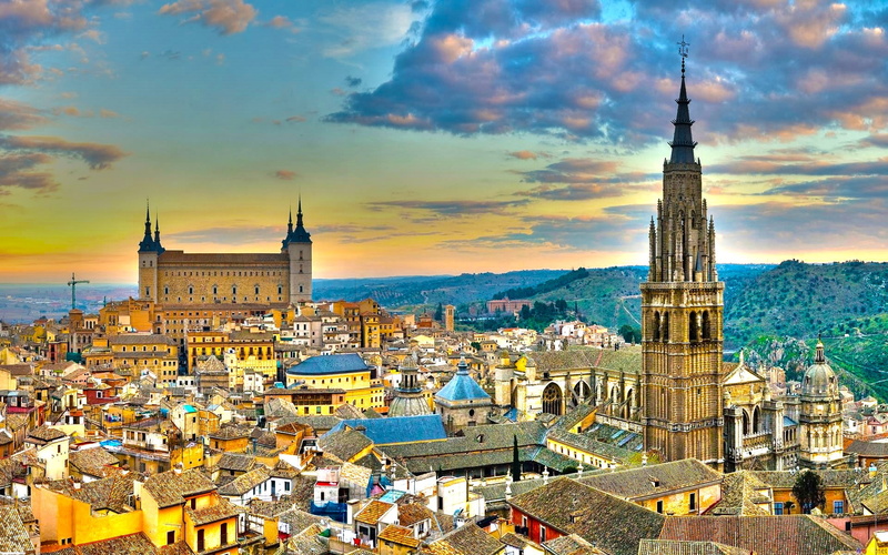 trees, crowd, outdoors, sky, nature, hills, church, travel destinations, spire, building exterior, Toledo, cityscape, rooftops, place of worship, built structure