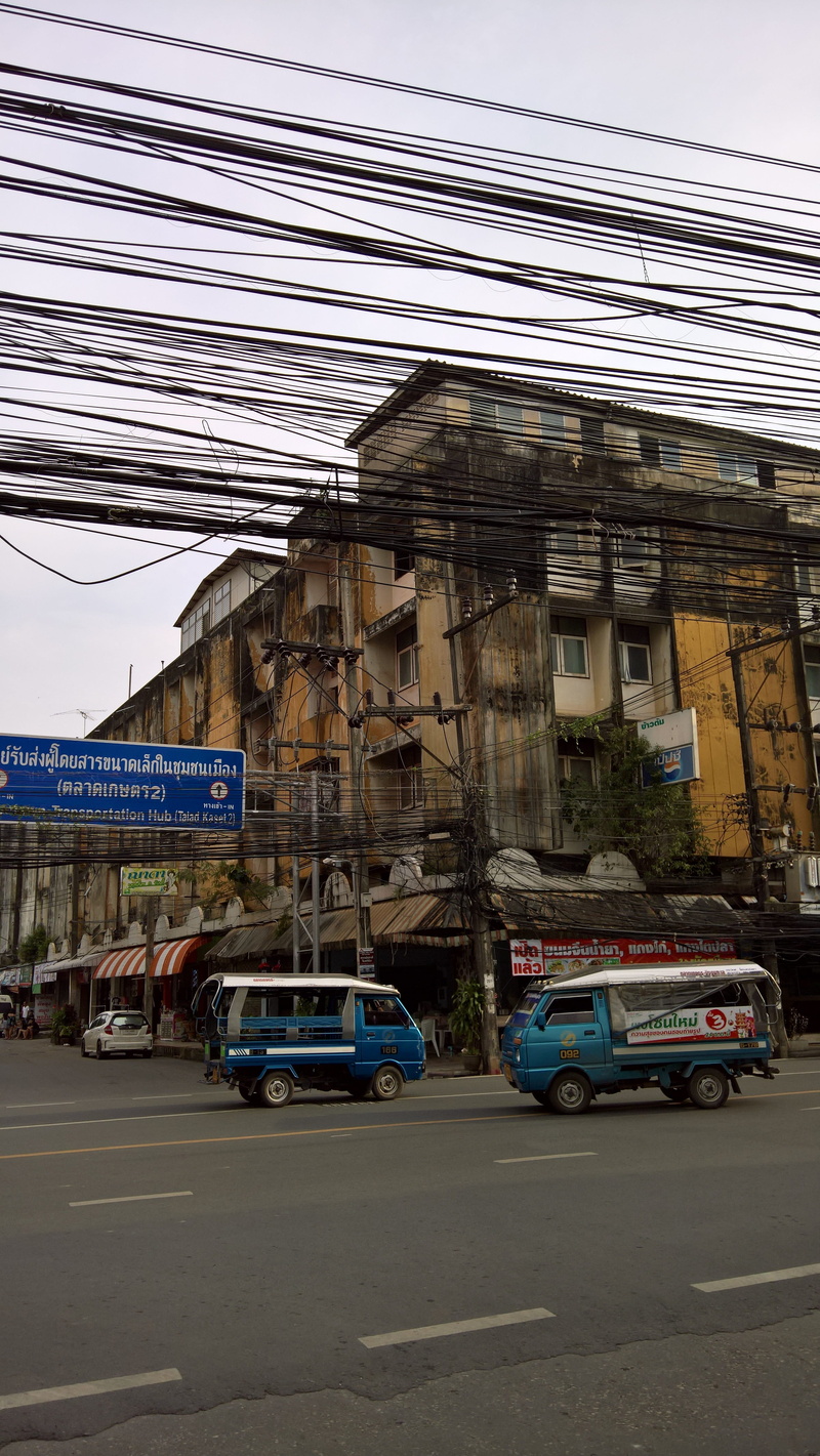 city, architecture, nature, motor vehicle, stationary, parking, land vehicle, car, residential district, thailand, transportation, tuk tuk, cables, cable