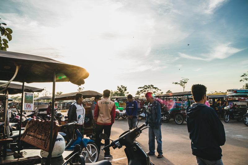 transportation, group of people, leisure activity, day, man, bicycle, adult, women, men, krong siem reap, lens flare, motorbikes, sunlight, bikes, rough