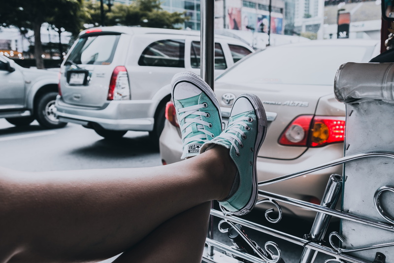 tops, bangkok, transportation, low, car, human body part, focus on foreground, woman, hand, day, lifestyles, foot, land vehicle, human hand, tuk tuk, real people