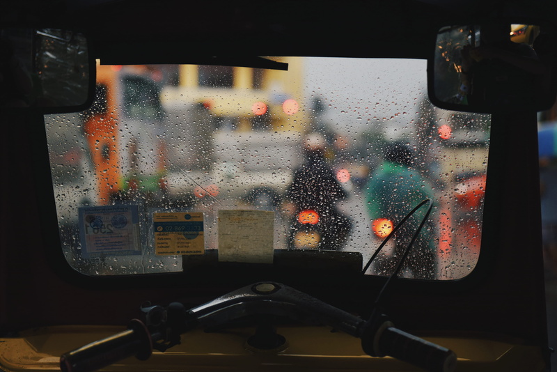 2K, mode of transportation, tuk tuk, droplet, land vehicle, focus on foreground, window, persons, car, wet, close-up, no people, rickshaw, close, indoors