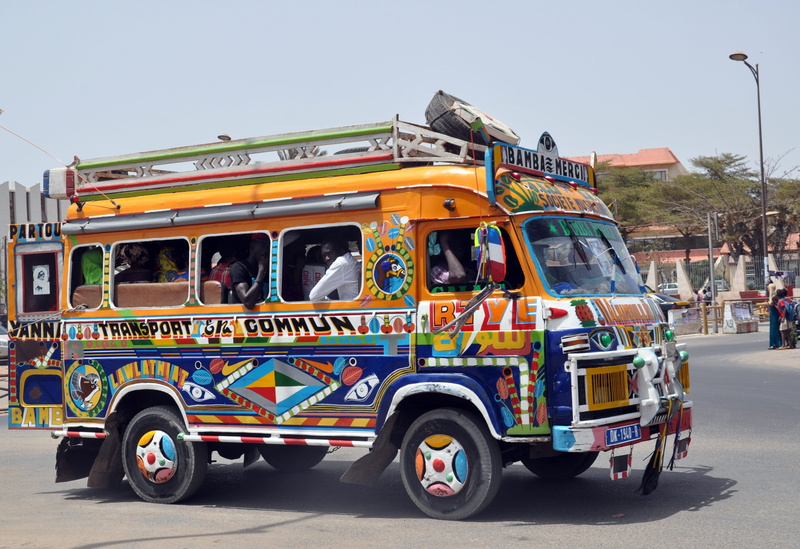school bus, land vehicle, transportation, road, architecture, car, incidental people, jinrikisha, rickshaw, dakar, day, bus, 2K, street, senegal, motor vehicle