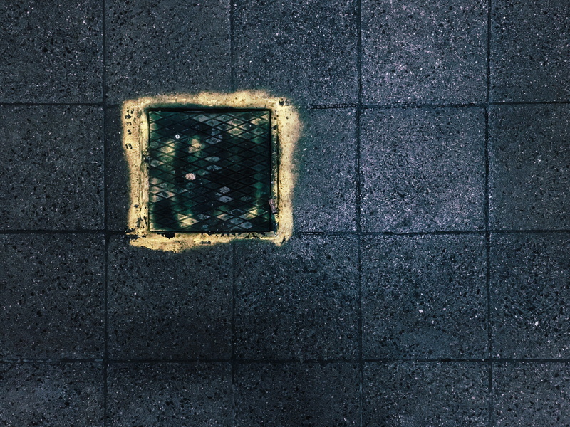 wooden, square shape, hole, design, footpath, stain, outdoors, two, black, flagstone, boards, rust, prison, architecture, paving stone, path, drain, slate