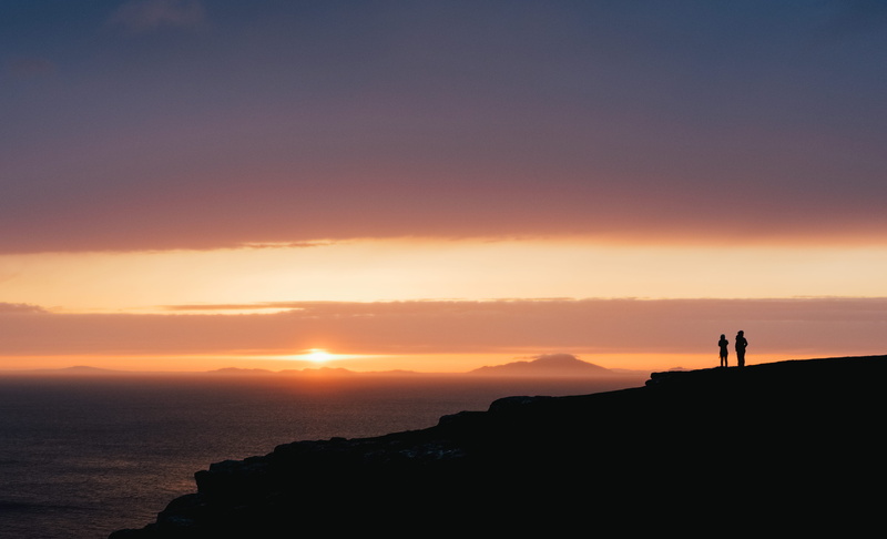 copy space, standing, beauty in nature, sky, activity, nature, ocean, tranquility, haze, sunset, top, hot, mountain, leisure activity, hour, coloudscape