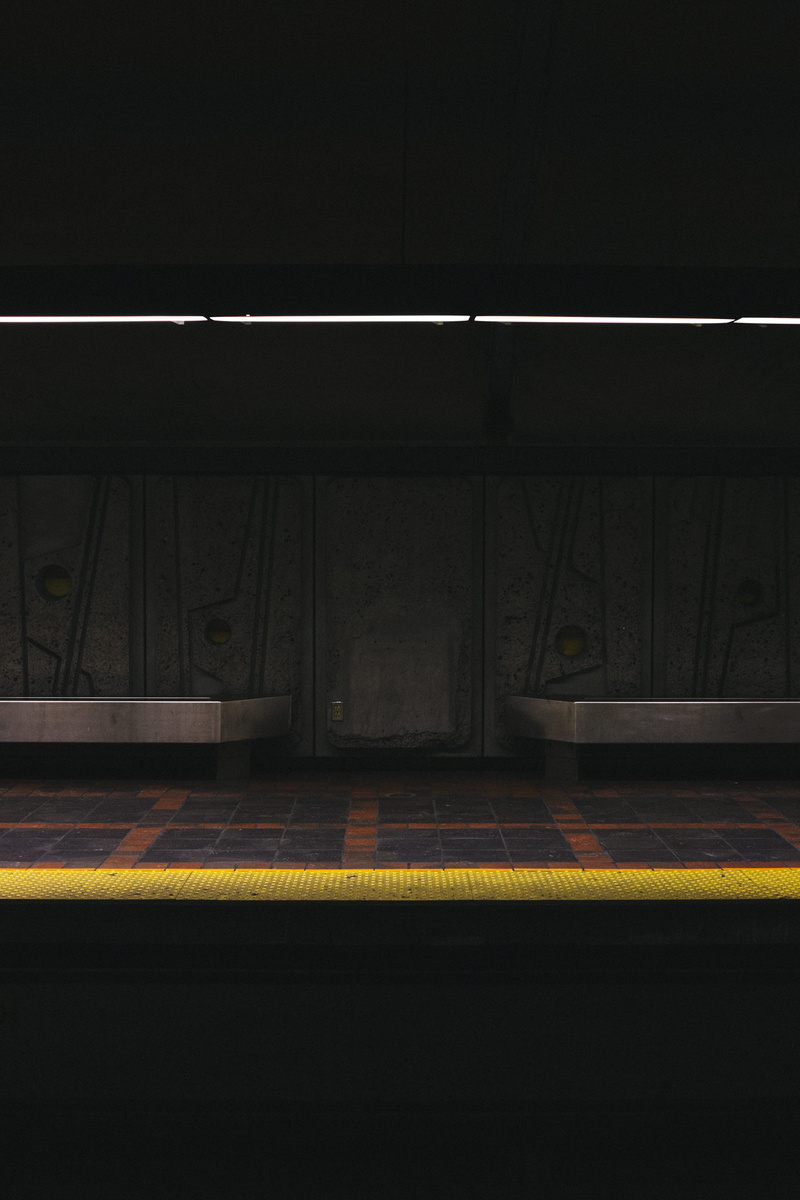 indoors, road, illuminated, railroad station platform, flooring, parking lot, challenge, montréal, subway, yellow, vehicle, ceiling, shadow, terminal, road marking