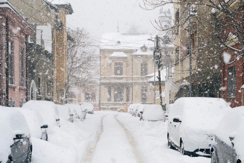 outdoors, building, tree, snow, day, no people, nature, city, land vehicle, cold temperature, transportation, blizzard, mode of transportation, building exterior