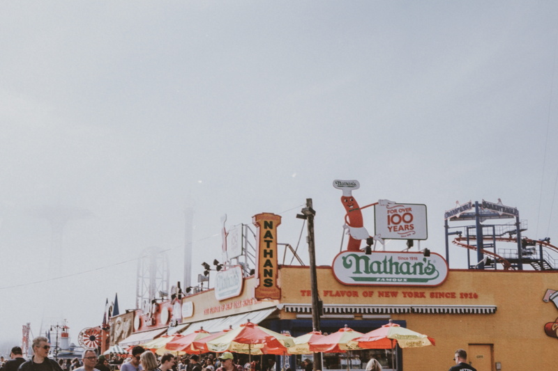 nathans, communication, dock, amusement park, group of people, building exterior, theme park, pier, steamer, store, human, port, fog, leisure activities