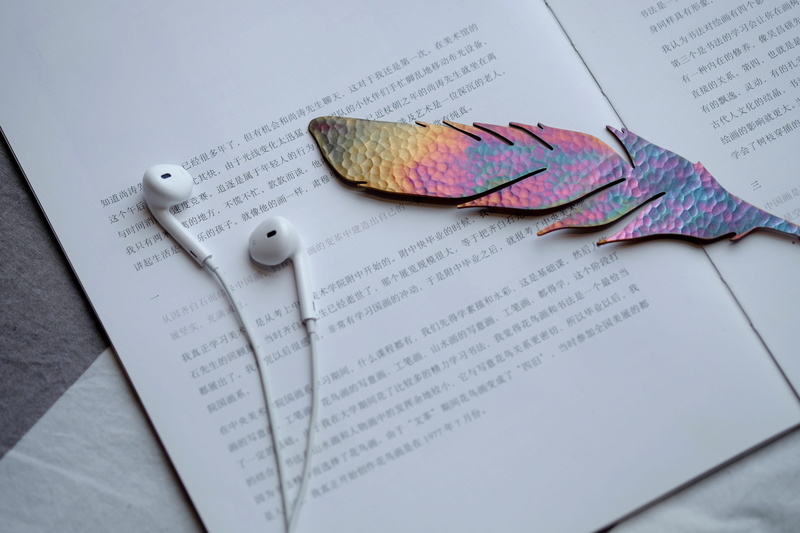 handmade, oriento, china, western script, paper, guangzhou, table, earbuds, positive emotion, bronze, copper, white, books, headphone, high angle view