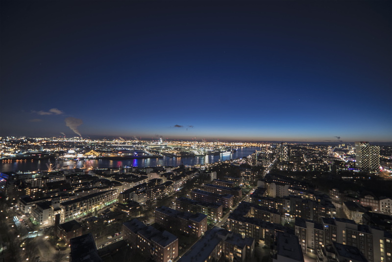 reflection, office building exterior, residential district, travel, clouds, river, crowd, building exterior, travel destinations, citylights, high angle view