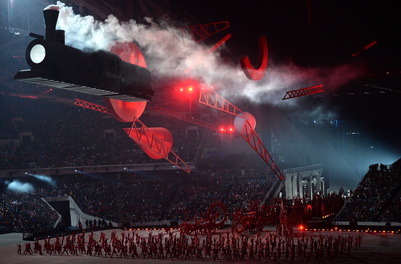 winter, light, stage - Performance Space, architecture, city, smoke - physical structure, illuminated, olympic games, red, positive emotion, fun, building exterior
