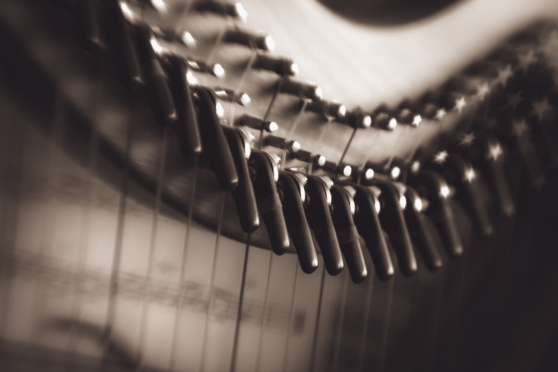indoors, musical equipment, studio shot, levers, orchestra, piano, in a row, retro Styled, no people, Instrument, melody, black color, equipment, single object
