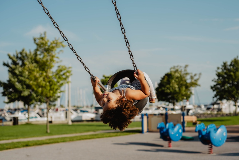 chair, summer fun, nature, lifestyles, play, swinging, leisure Activity, happiness, outdoor, smiling, playful, mixed baby, childhood, swingset, sunlight