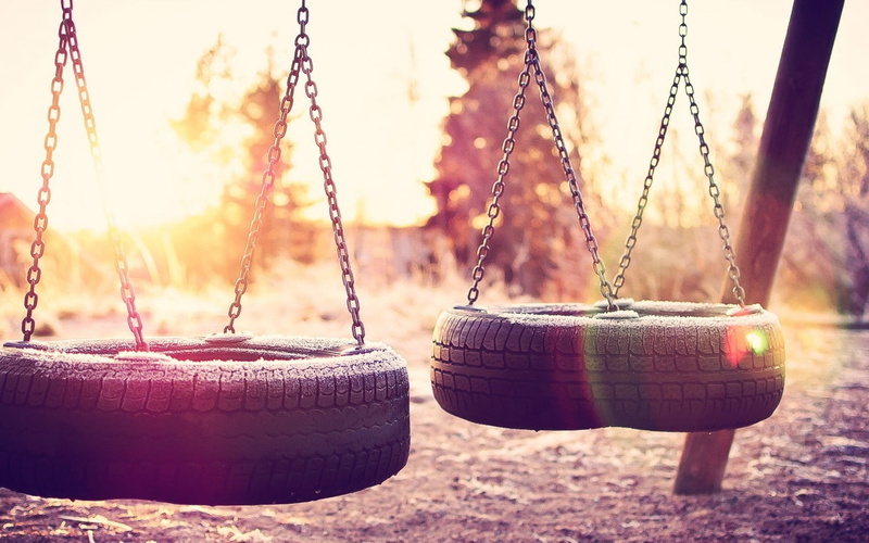 swing, swings, chain, hanging, outdoors, lens flare, metal, chains, selective focus, wood - material, no people, focus on foreground, outdoor play equipment