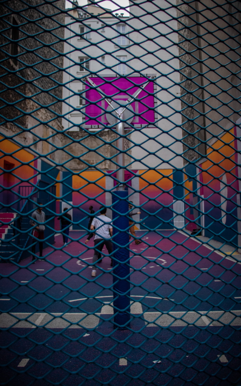 communication, pigalle, chainlink fence, gate, sign, outdoors, fence, road, paris, lighting, transportation, indoor play area, play area, stained glass