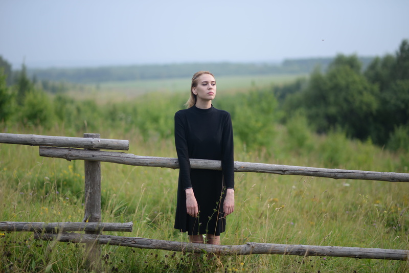 grass, landscape, 5K, wood, wooden fence, blond hair, farm, real people, plant, one person, field, scenic, leisure activity, front view, woman, day, young women