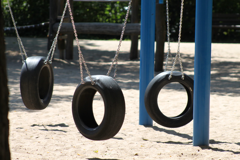 swing plate, tire, green, boy, Device, wood, focus on foreground, game device, rocking horse, no people, childrens playground, wiggle, shape, Play, fun