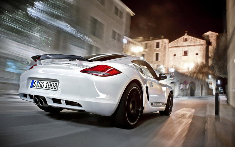 wheel, mode of transportation, city, built structure, motion, speed, land vehicle, blurred motion, city life, architecture, transportation, Porsche, physical activity