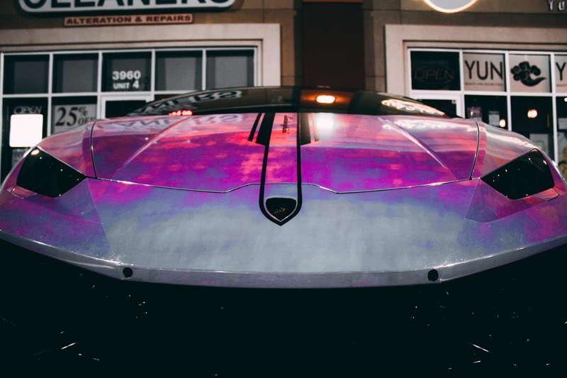 night, mode of transportation, multi colored, ontario, land vehicle, outdoors, shiny, glass - material, reflective, pink color, day, architecture, transportation