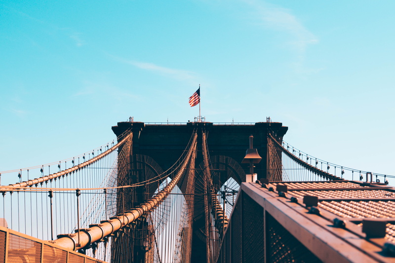 sky, nature, travel destinations, low angle view, 5K, patriotism, independence, bridge, outdoors, tourism, American flag, transportation, building exterior