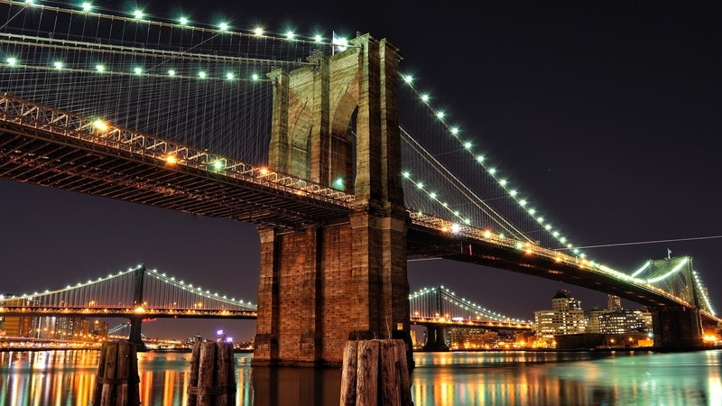 illuminated, bridge, built structure, tourism, New York City, water, suspension bridge, outdoors, travel destinations, city, engineering, skyscraper, night