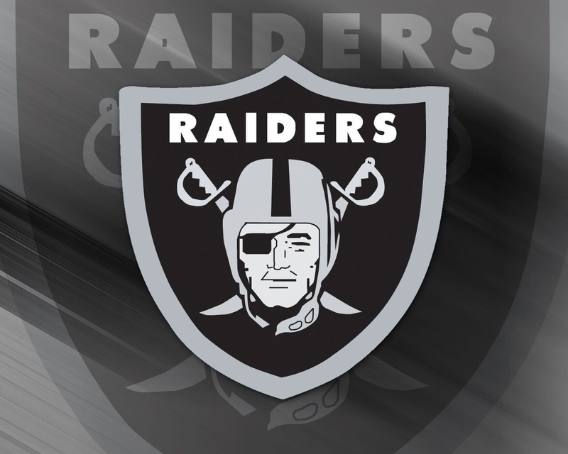 representation, symbol, indoors, human representation, guidance, Oakland Raiders, information, sign, communication, text, Football, no people, close-up