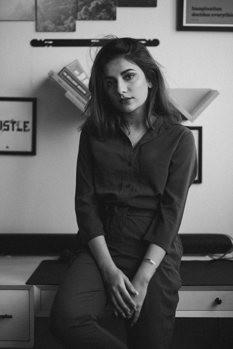 girl, portraits, india, indoors, lifestyles, sleeve, monochrome, standing, furniture, waist up, casual clothing, three quarter length, long sleeve, sitting