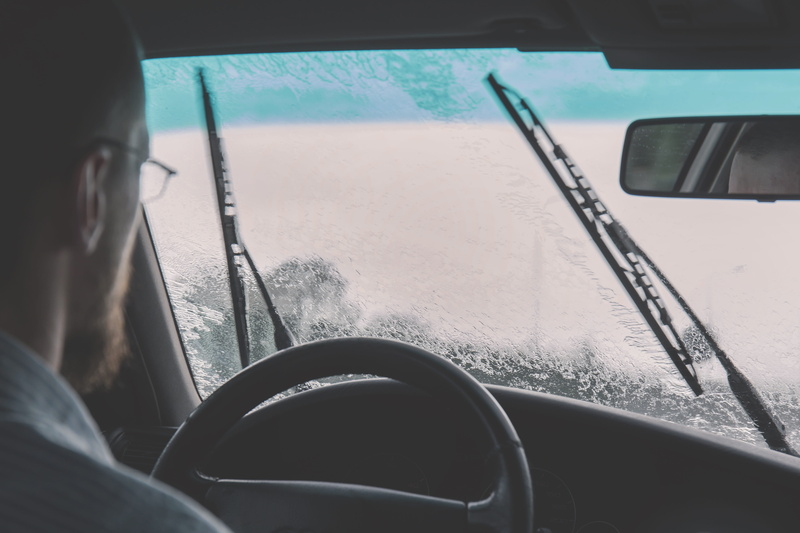 transportation, wiping, guy, mode of transportation, rainy, indoors, one person, car, driving, steering wheel, road trip, people, nature, land vehicle