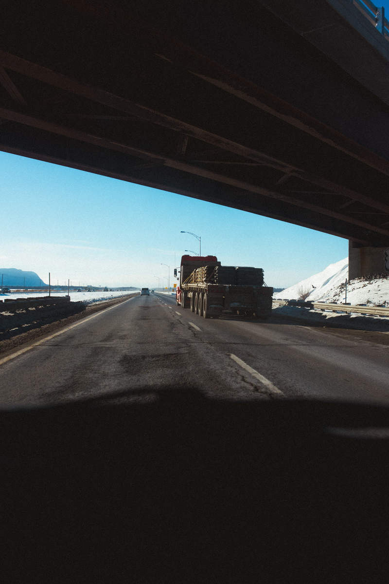 canada, day, mode of transportation, land vehicle, 5K, glass - material, motor vehicle, road, overpass, 18 wheeler, sky, car, travel, car point of view