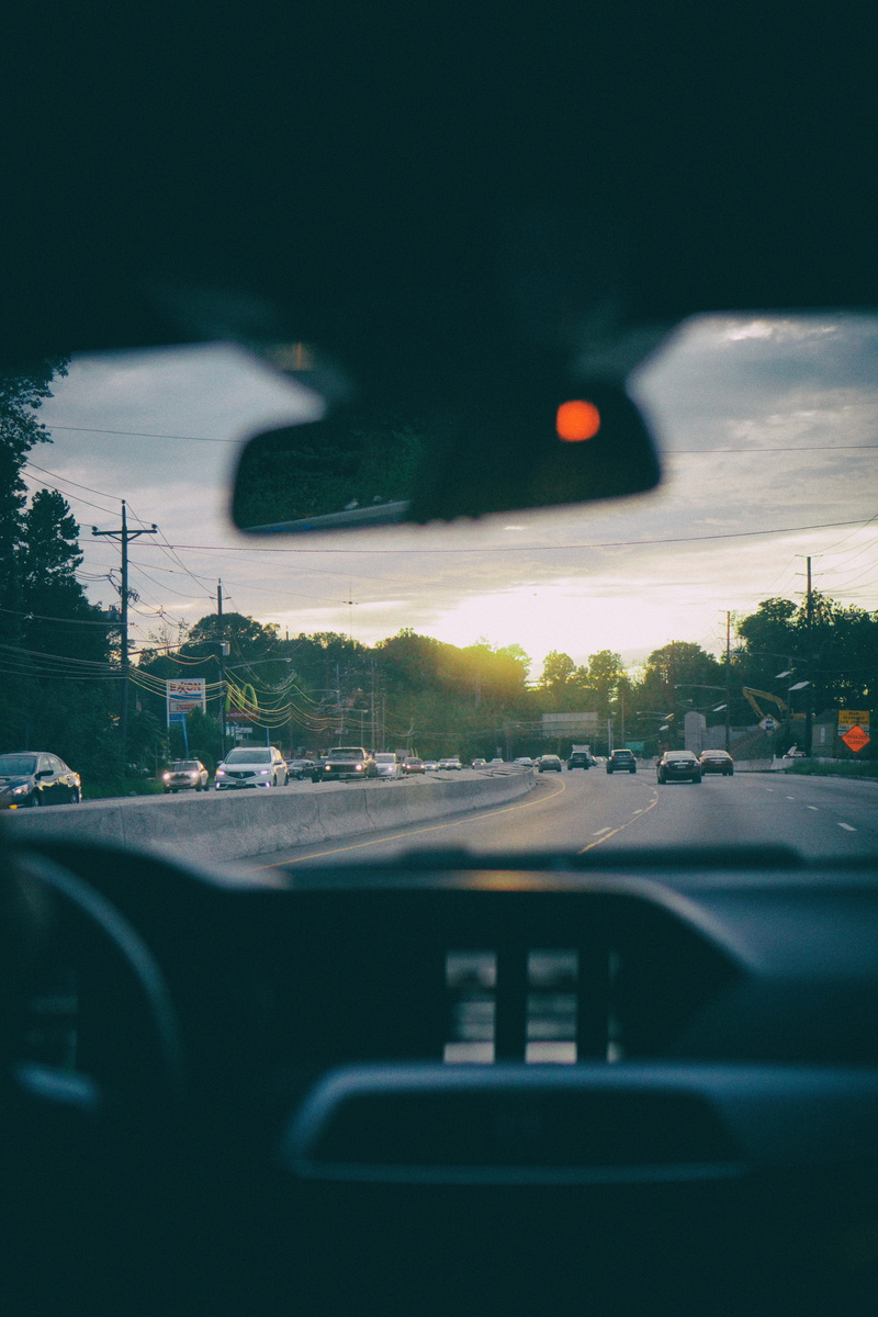 car point of view, road, glass - material, street, city, travelling, car interior, indoors, car, asphalt, person, adventure, on the move, vehicle interior