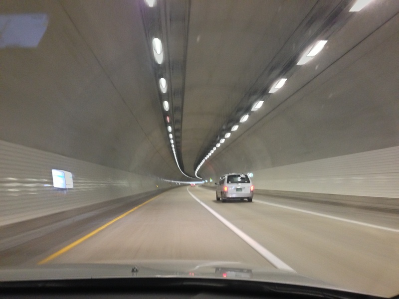 light, glass - material, cool, vehicle interior, car, no people, car interior, symbol, tunnel, direction, ceiling, highway, windshield, on the move, transparent
