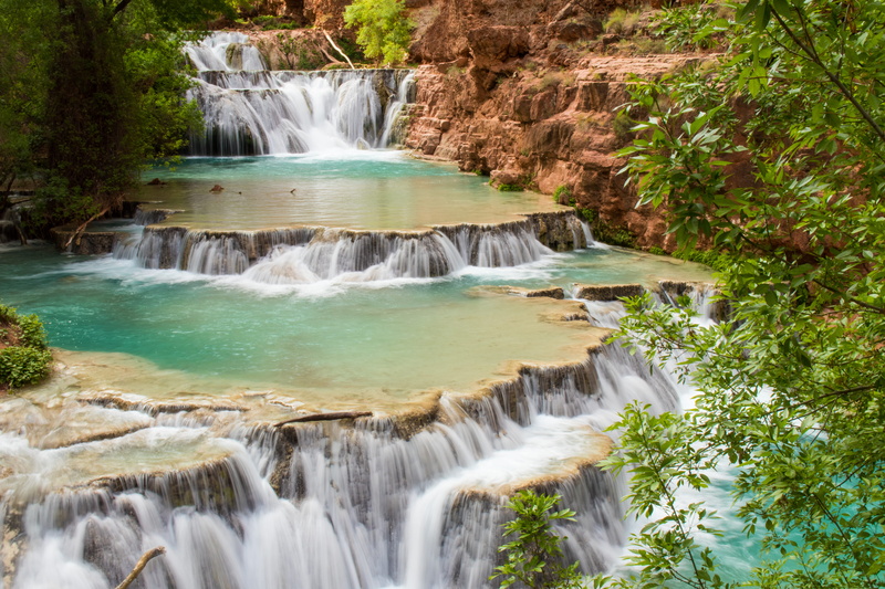 havasu, grandcanyon, beauty in nature, tree, spring, waterfall, travel destinations, stream - flowing water, rainforest, solid, hiking, rock - object, forest