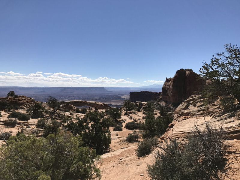 sky, rock, tranquility, outdoors, tranquil scene, landscape, arid climate, environment, mountain, beauty in nature, plant, clear sky, no people, arch, non-urban scene