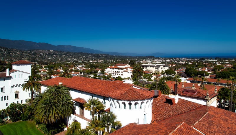 aerial, residential district, no people, mountains, urban, building exterior, roof, scenic, sky, palms, hear, blue, built structure, tree, cityscape, buildings