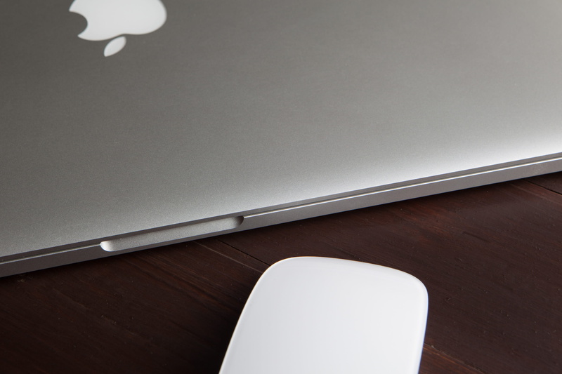no People, laptop, MacBook Pro, wall - building feature, ceiling, table, simplicity, absence, built structure, close-up, mouse, desk, white color, day