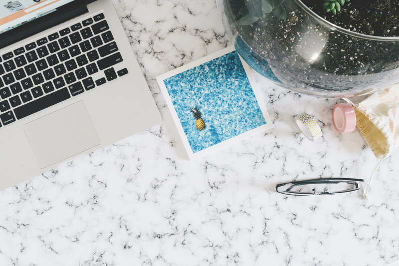 still life, surface, close-up, table, clear, directly above, no people, polaroid, keyboard, laptop, glasses, gray, drinking glass, cold temperature, macbook