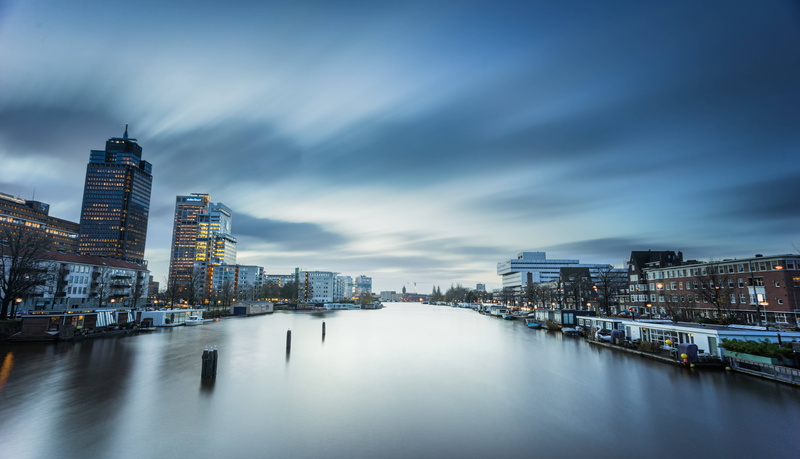 city, built structure, river, modern, bridge, nature, cityscape, residential district, no people, building exterior, reflection, dusk, financial district