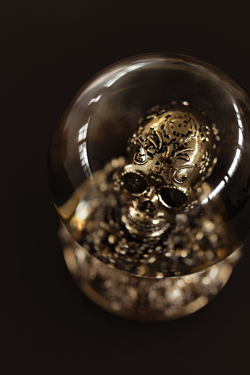 directly above, snow globe, gold, indoors, still life, shape, gold colored, food and drink, glass - material, globe, spooky, 5K, golden, glass, studio shot