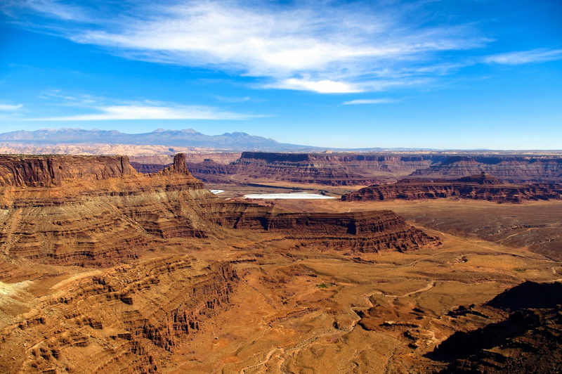 canyon, no people, formation, desert, mountain, natural, beauty in nature, tranquility, red, dramatic landscape, 2K, scenic, cloud - sky, remote, erosion
