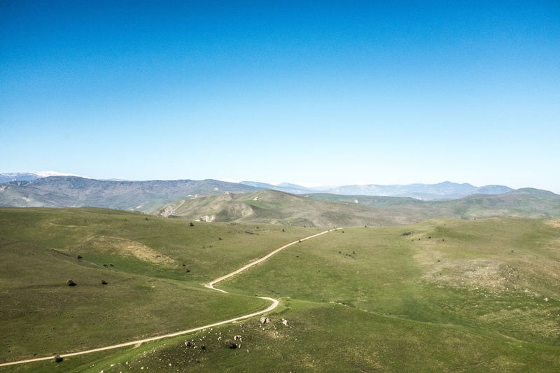 sky, mountains, scenics - nature, transportation, wide, tundra, grasslands, mountain, environment, outdoors, view, aserbaidschan, day, tranquil scene, long road
