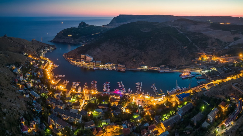 beach, scenics - nature, building exterior, illuminated, 1080P, dusk, evening, sevastopol bay, environment, black sea, outdoors, aerial photography, city