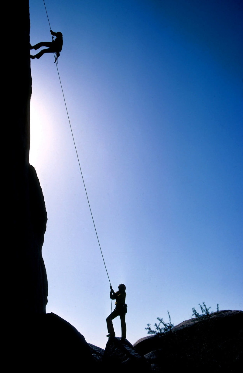 support, teamwork, outdoors, 1080P, sky, low angle view, persistence, leisure activity, hand, challenge, man, extreme sports, mountains, sport, activity