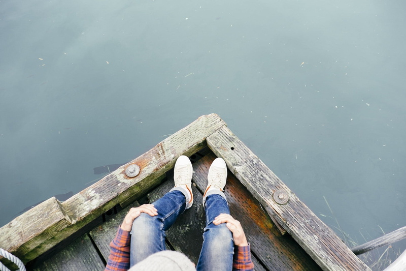 one person, nature, dock, casual clothing, pants, sitting, feet, adult, view, shoe, 720P, jetty, photo, human foot, body part, pier, high angle view, wood