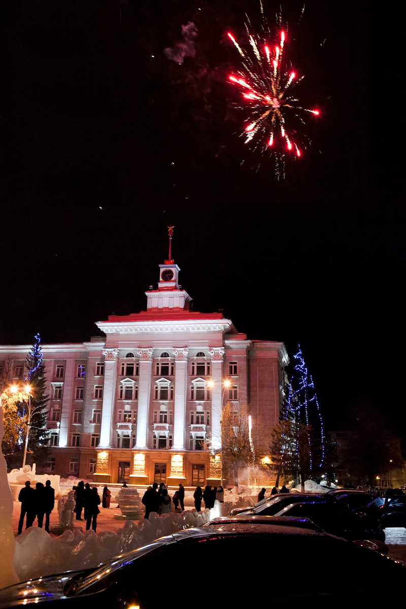 illuminated, firework, motion, outdoors, city, light, incidental people, night, tourism, group of people, arts culture and entertainment, architectural column