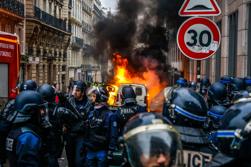 clothing, communication, france, street, fire, aggression, military, apparel, riot, built structure, wearing, sign, crowd, law, human, person, protest