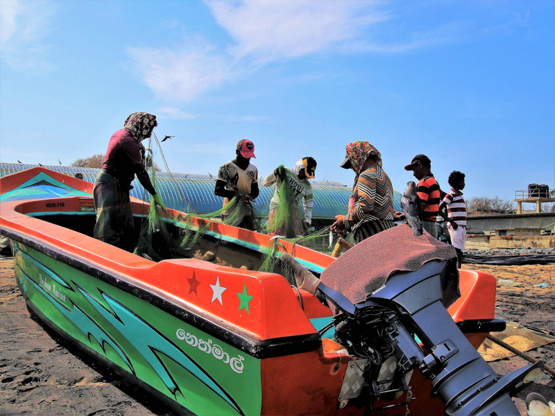 nautical vessel, network, lifestyle, orange, land vehicle, fisherman, beach, people, water, fishing industry, men, travel, dirty, sea, medium group of people