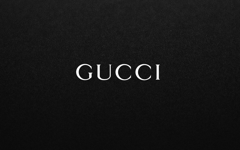 message, studio shot, low angle view, dark, text, communication, black color, capital letter, black, 4K, gucci, close-up, western script, indoors